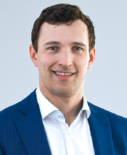 Martin Moisel, Leiter der Veolia-Niederlassung in Döbeln Ein Mann mit braunen Haaren, der freundlich in die Kamera lächelt. Er trägt einen Anzug.